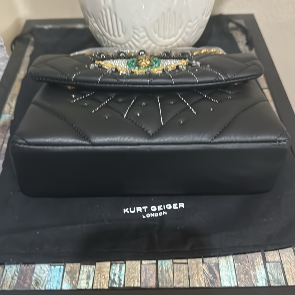 Kurt Geiger London
Mini Kensington Eye Crossbody Bag - Picture 15 of 15
